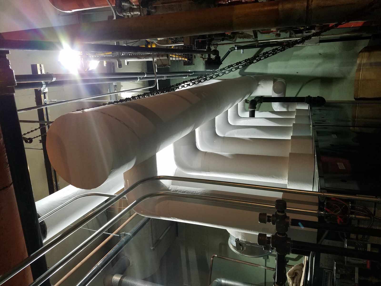 Insulated commercial boiler piping installed by Ravenshade